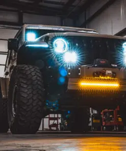 Jeep Wrangler JL with AAL Modular Front Bumper lower splash guard and amber light bar illuminated