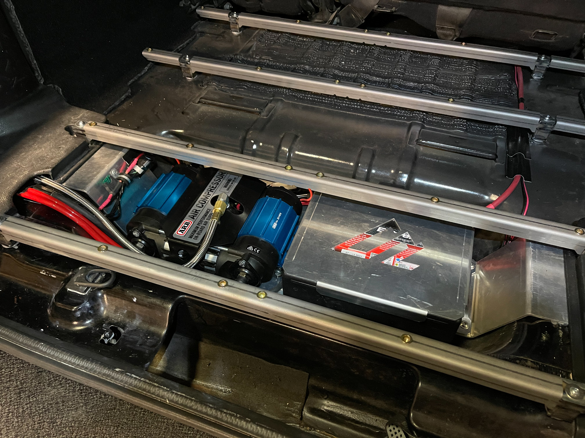 Jeep JKU Cargo Compressor and Auxiliary Battery Mount - American Adventure  Lab
