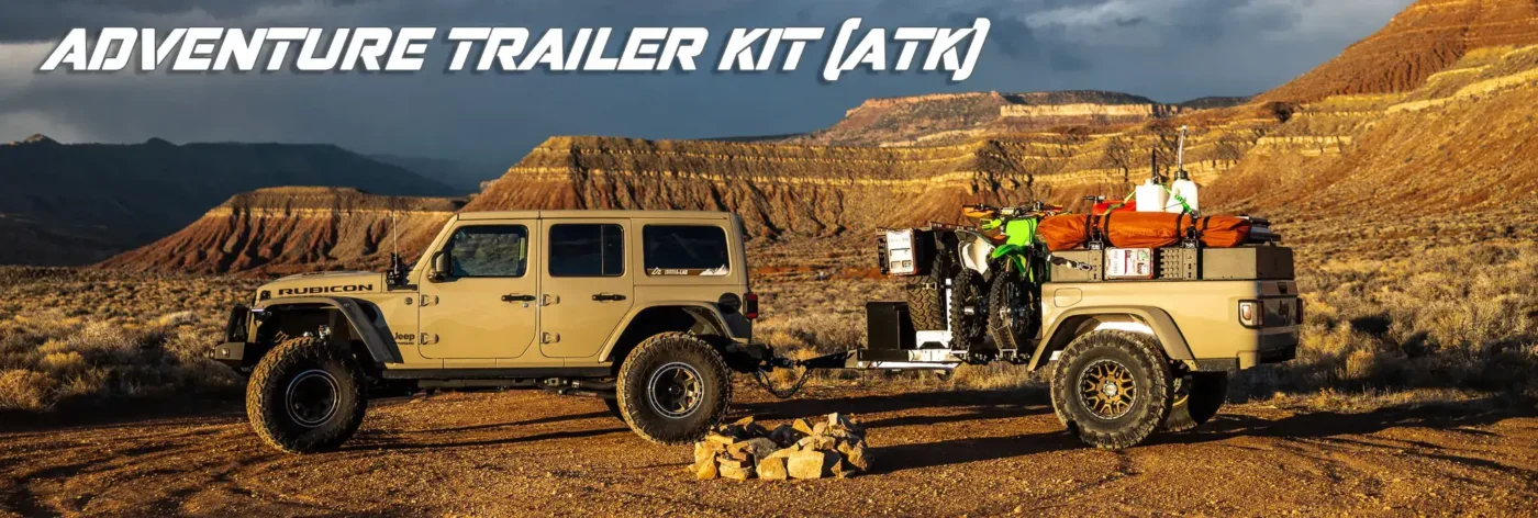 Jeep Wrangler 392 towing one of our Adventure Trailer Kits with 2 dirtbikes and loads of camping gear.